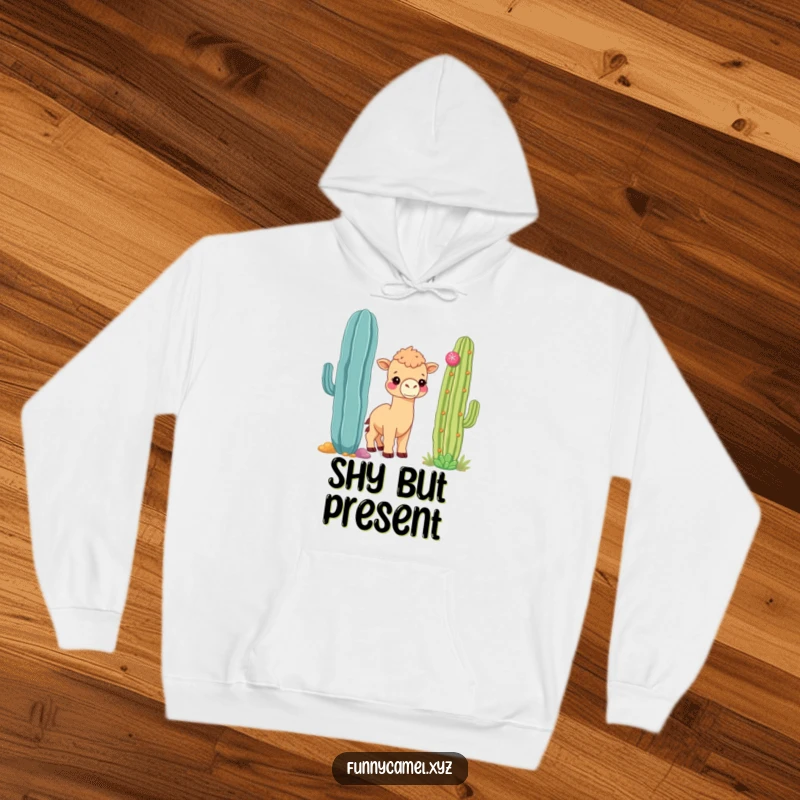 Funny shy kawaii camel peeking from behind a colorful cactus, printed on a soft, warm hoodie.